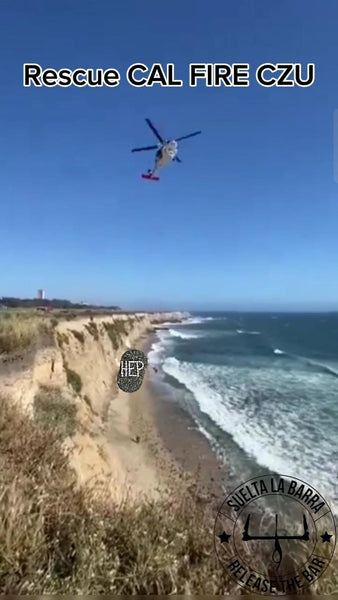 HELP escrito en la arena salva a un kitesurfista varado en California.
